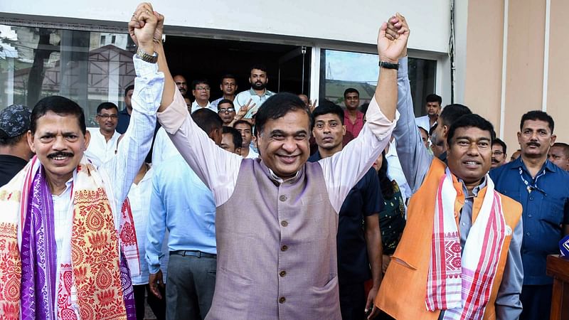 Assam Chief Minister Himanta Biswa Sarma with Bharatiya Janata Party (BJP) candidates Rameswar Teli and Mission Ranjan Das after they file their nomination papers for the Rajya Sabha by-polls, in Guwahati on 21 August 2024